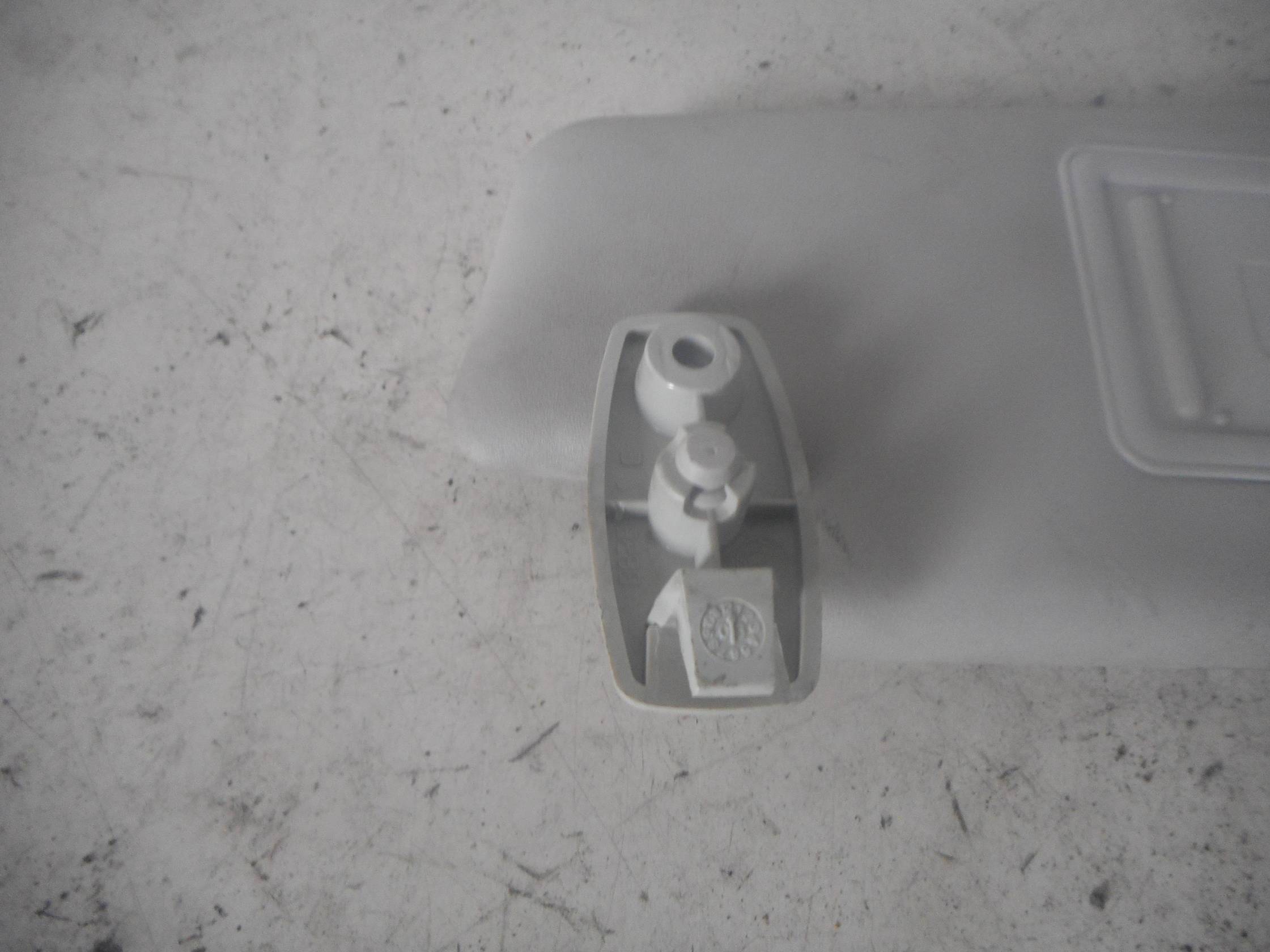 Aletta parasole parabrezza dx.